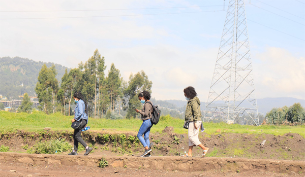 PMA resident enumerators on the way to collect data in a village near Addis Ababa